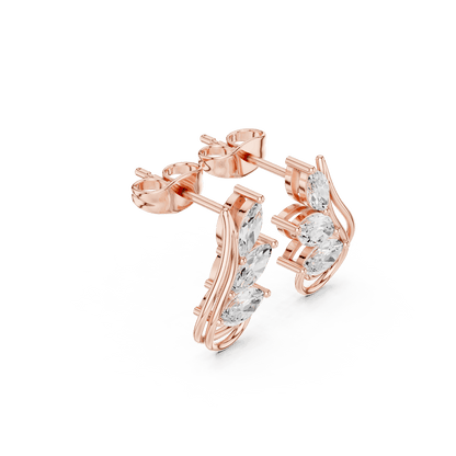 Marquise diamond leaf stud earrings featuring a nature-inspired design with sparkling marquise and round stones and secure push-back closures by Aortas Jewels.