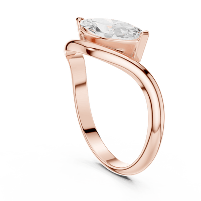 Marquise solitaire diamond ring featuring an elegant marquise-cut center stone on a sleek polished band by Aortas Jewels.