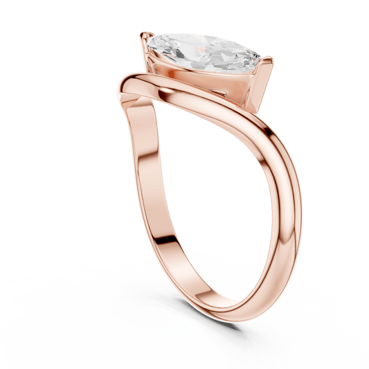 Marquise solitaire diamond ring featuring an elegant marquise-cut center stone on a sleek polished band by Aortas Jewels.