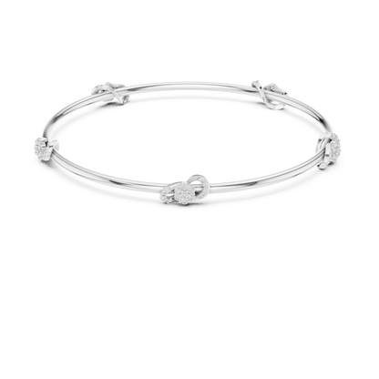 Minimalist floral crystal bangle bracelet featuring delicate flower-inspired charms on a sleek polished silver-tone bangle by Aortas Jewels.