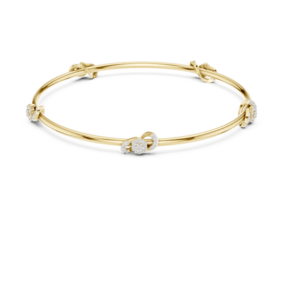 Minimalist floral crystal bangle bracelet featuring delicate flower-inspired charms on a sleek polished silver-tone bangle by Aortas Jewels.
