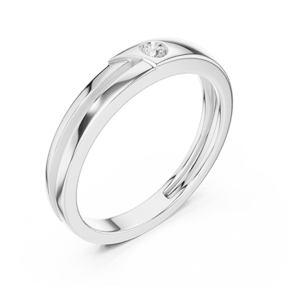 Minimalist solitaire diamond band ring with a sleek polished design and a single sparkling stone by Aortas Jewels.