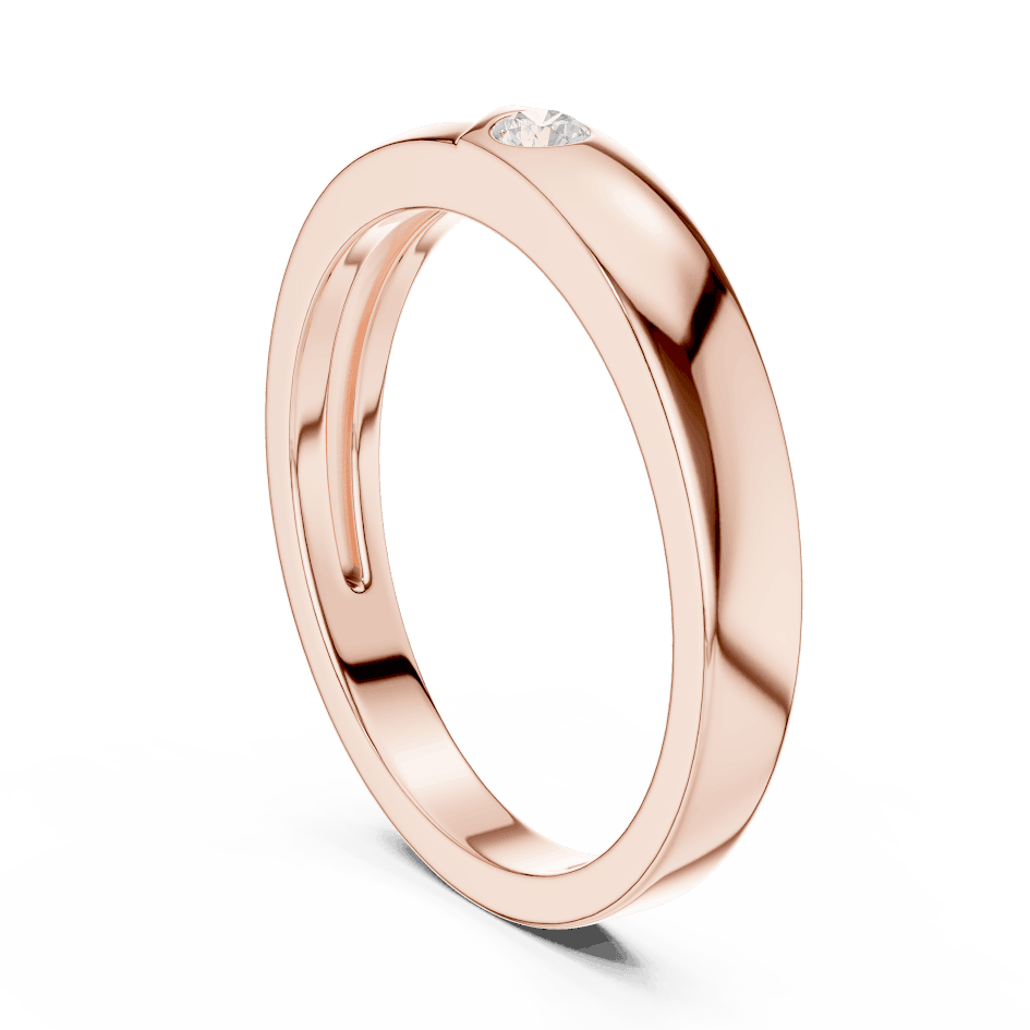 Minimalist solitaire diamond band ring with a sleek polished design and a single sparkling stone by Aortas Jewels.