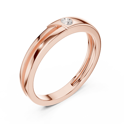 Minimalist solitaire diamond band ring with a sleek polished design and a single sparkling stone by Aortas Jewels.