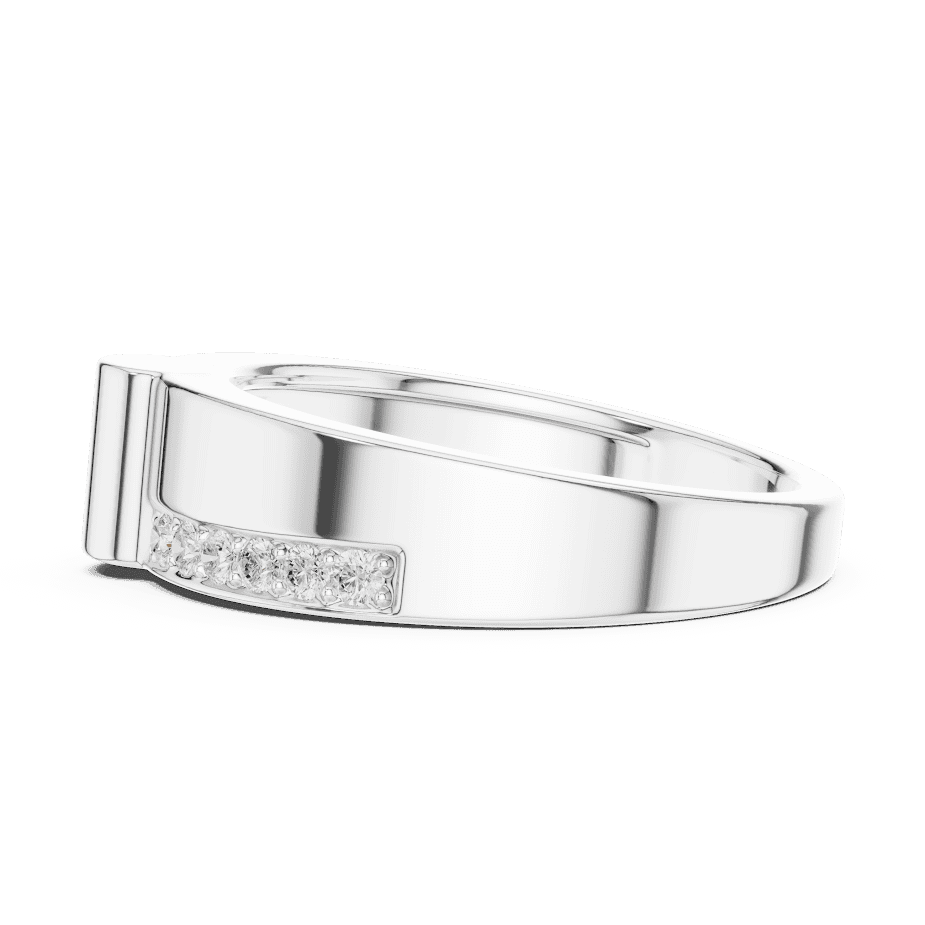 Modern channel-set diamond band ring with a sleek polished finish and sparkling accent stones by Aortas Jewels.