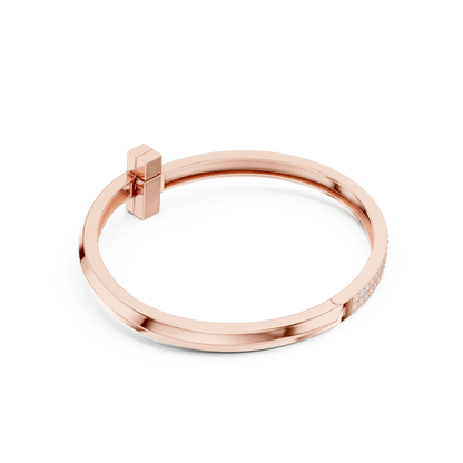 Modern pavé diamond nail bangle featuring a sleek polished nail-inspired design with sparkling pavé-set diamonds by Aortas Jewels.