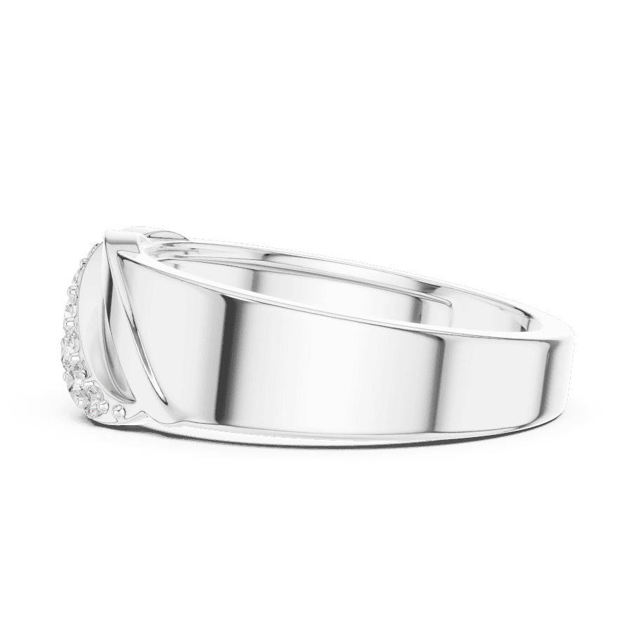 Modern twist solitaire diamond ring featuring a sleek crossover band and sparkling round center stone by Aortas Jewels.