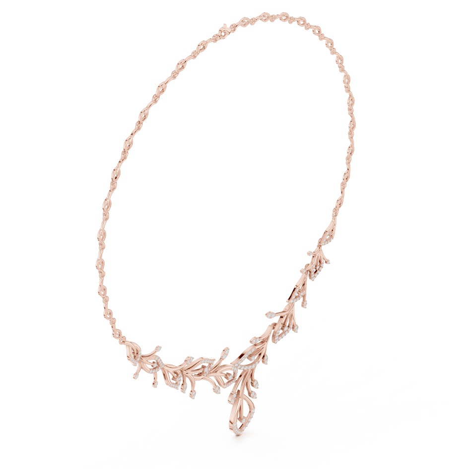 Nature-inspired yellow gold leaf necklace with an elegant vine design and sparkling stone accents by Aortas Jewels.