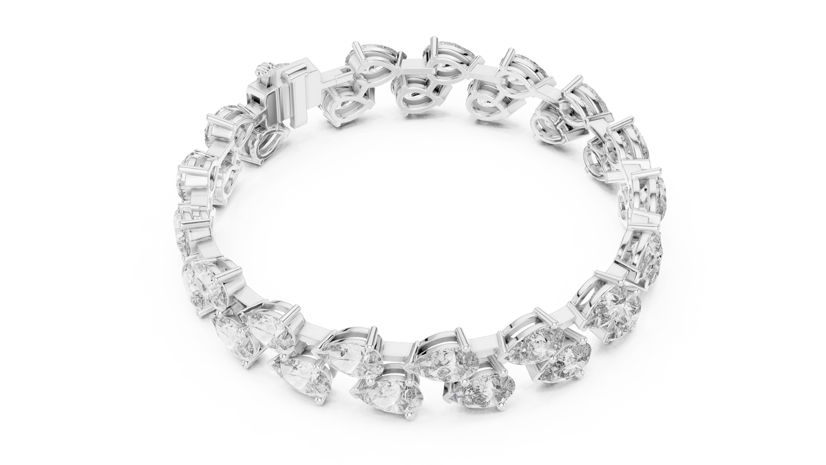 Pear Cut Diamond Tennis Bracelet featuring a double row of sparkling pear-shaped stones with a secure box clasp by Aortas Jewels.