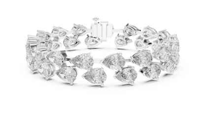 Pear Cut Diamond Tennis Bracelet featuring a double row of sparkling pear-shaped stones with a secure box clasp by Aortas Jewels.