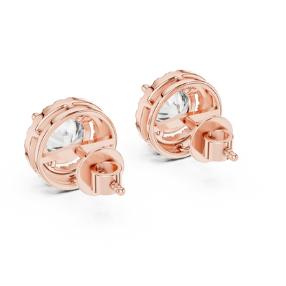 Round halo diamond stud earrings featuring brilliant center stones surrounded by sparkling halo accents with secure stud backs by Aortas Jewels.