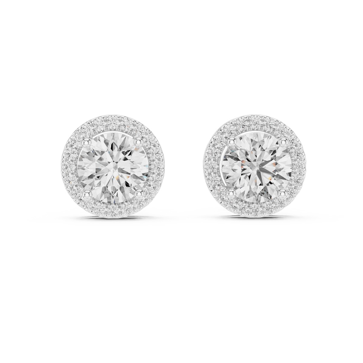 Round halo diamond stud earrings featuring brilliant center stones surrounded by sparkling halo accents with secure stud backs by Aortas Jewels.