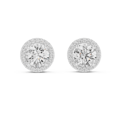 Round halo diamond stud earrings featuring brilliant center stones surrounded by sparkling halo accents with secure stud backs by Aortas Jewels.