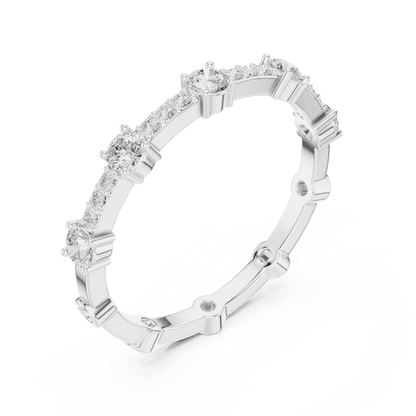 Shared Prong Diamond Eternity Band featuring brilliant round diamonds in a polished half eternity shared-prong setting by Aortas Jewels.