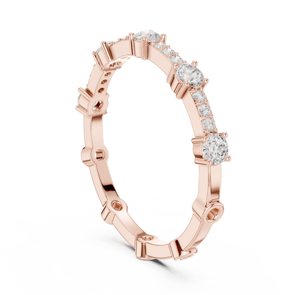 Shared Prong Diamond Eternity Band featuring brilliant round diamonds in a polished half eternity shared-prong setting by Aortas Jewels.