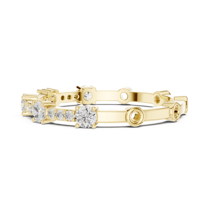 Shared Prong Diamond Eternity Band featuring brilliant round diamonds in a polished half eternity shared-prong setting by Aortas Jewels.