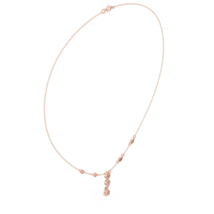 Elegant teardrop diamond pendant necklace with a delicate chain and sparkling accent stones by Aortas Jewels.