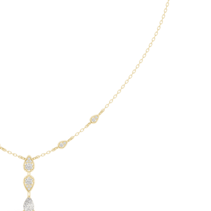 Elegant teardrop diamond pendant necklace with a delicate chain and sparkling accent stones by Aortas Jewels.