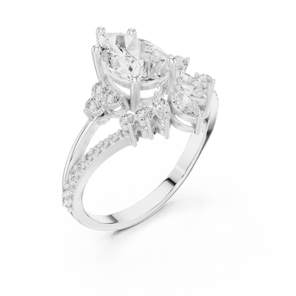 Three-stone diamond engagement ring featuring a brilliant round center stone, sparkling side stones, and a pavé-set band by Aortas Jewels.