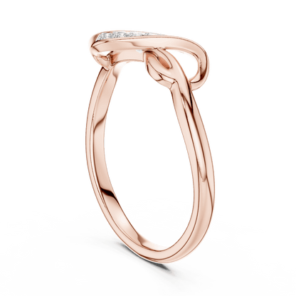 Twisted Infinity Diamond Ring featuring an elegant crossover band with sparkling accent stones and a polished finish by Aortas Jewels.