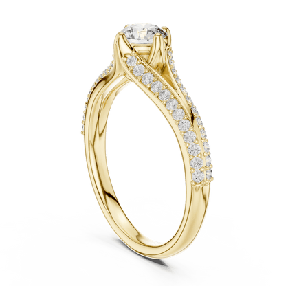 Twisted pavé solitaire diamond ring featuring a round-cut center stone, elegant crossover band, and sparkling pavé-set diamonds by Aortas Jewels.
