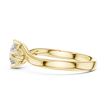 Twisted solitaire diamond engagement ring featuring a round-cut center stone in a four-prong setting with a sleek sculpted twisted band by Aortas Jewels.